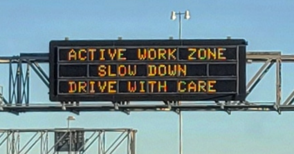 Messages on the overhead signs along I-10 in the work zone remind drivers to slow down! 