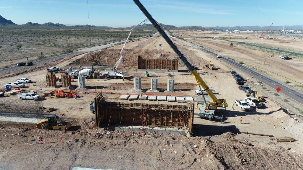 Crews work on building the Loop 303 traffic interchange at 43rd Avenue.