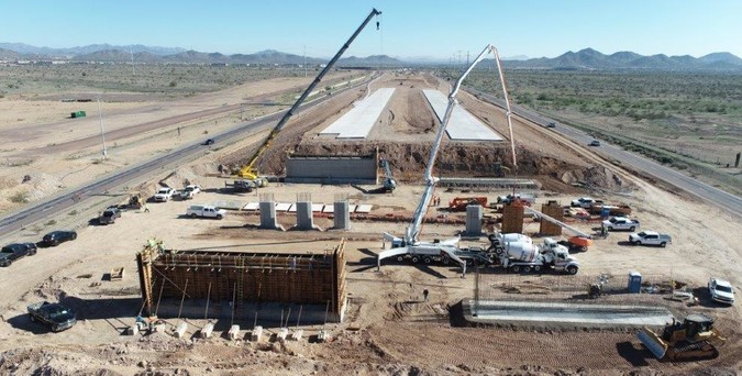 Aerial photo of L303 project showing construction of 43rd Avenue interchange.