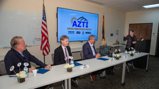 Platform party marking ADOT research partnership with universities