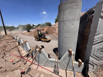 mechanically stabilized earth walls being constructed on the bridge over the Consolidated Canal on Loop 202