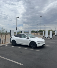 Photo of vehicle at electric vehicle charging station 