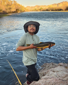 Julian B. man holding large sonora suckerfish