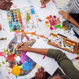 A Group of people attending an art class