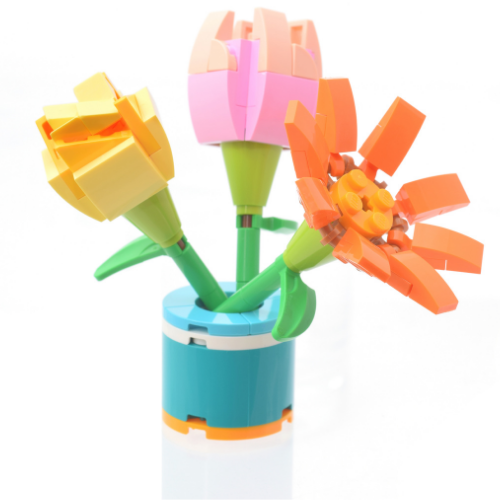 A bouquet of flowers made of legos on a white backgroud
