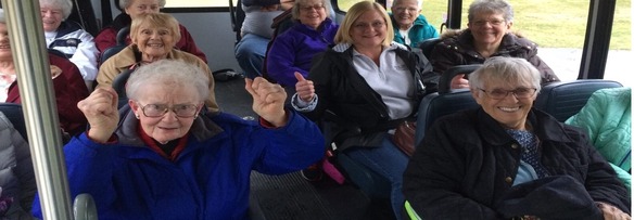 Group of Older Adults on a Bus