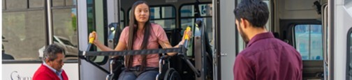 a person on a bus lift