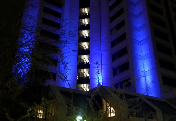 Admin Building Lit Blue  to Pay Tribute to Healthcare Workers