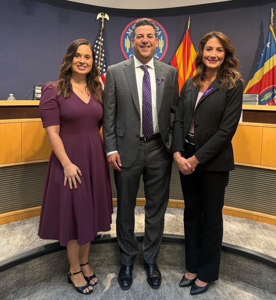 Taylor, myself, and Michele from my D2 team all wearing purple to spread awareness about domestic violence.