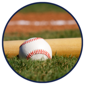 baseball gear on grass- round closeup image