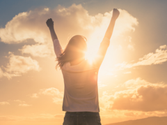 person outside celebrating - resilient