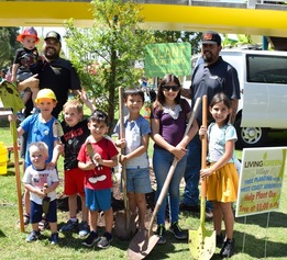 Volunteers planting trees at Pioneer Park on April 2023