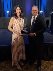 Councilmember and Boeing rep holding award