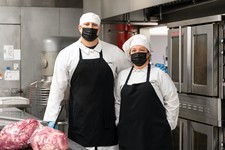 Kitchen staff wearing masks