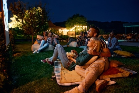 Happy couple watching a movie