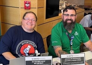 Karl Wagner and Valerie ElGhaouti, Pima County employees who table at the library
