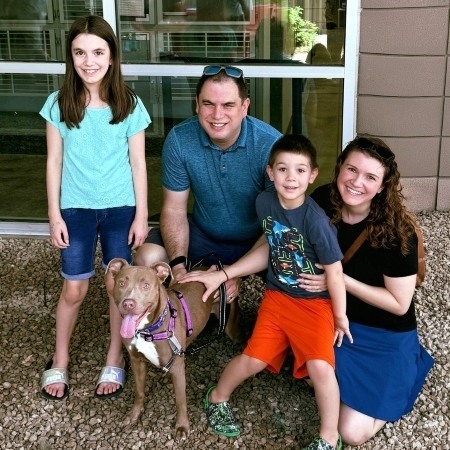 Foster dog Liv and family