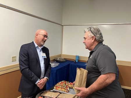 Deputy Administrator Carmine DeBonis and an employee from Fleet Services