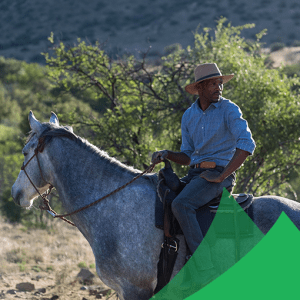 Black cowboy on a horse