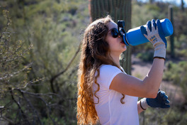 drinking water during a hike