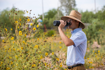 drinking from a water bottle