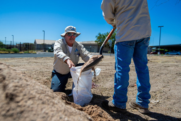 digging at sandbag station