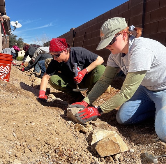 Working outside with rocks