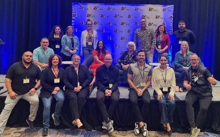 A group of people from Arizona pose for a photo at a Pathways to Prosperity conference
