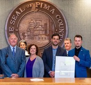 Pima County Econ Dev team with plaque