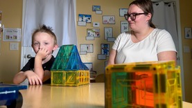 Mom and son at table
