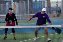 seniors playing pickleball 