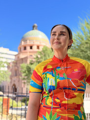 Woman wearing Loop jersey with the courthouse dome in the background