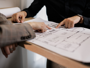 House plans being reviwed by two people