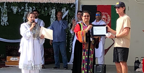 Afghan group presenting CM Kozachik with a certificate of appreciation