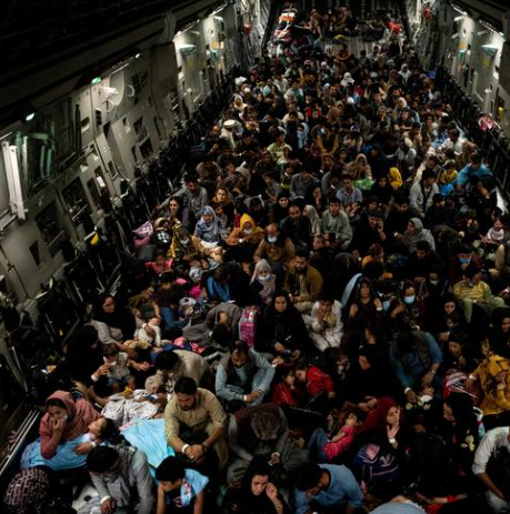 picture of the interior of a U.S. C-17 showing how we brought the Afghan refugees, crowded