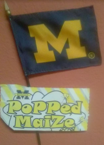 popcorn boxes with the Michigan logo 