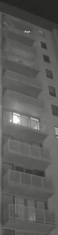 Balcony with 2 lights coming from it