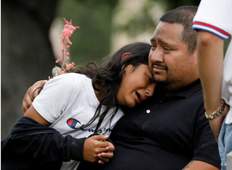 Picture showing a student and her family mourned after the shooting in the Uvalde elementary school