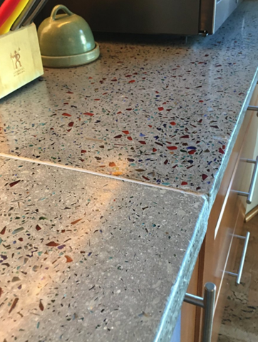 Picture shows kitchen countertop made from glass recycle