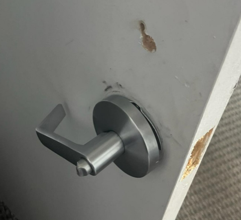 Picture shows broken door