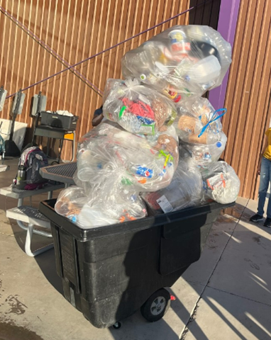 Picture shows several plastic bags stack on top of the cart