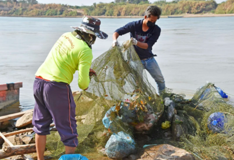 Photo of officials collecting plastic waste from the Mekong in Laos