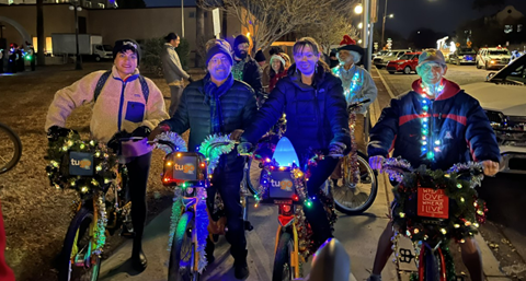 Picture of Vice Mayor Lane Santa Cruz, CM Kevin Dahl, CM Nikki Lee, CM Steve Kozachik on their Tugo's in the Parade of Lights downtown