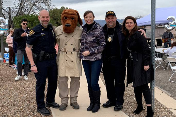  ODE Captain James Wakefield, McGruff the Crime Dog, Ward 4 Council Member Nikki Lee, a TPD Officer, and Mayor Regina Romero pose for a photo