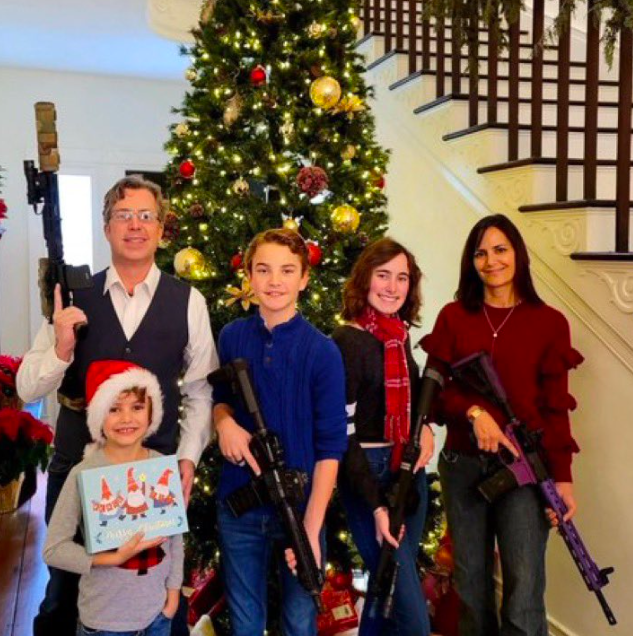 Picture of Representative Andy Ogles and his family carry guns for their Christmas card