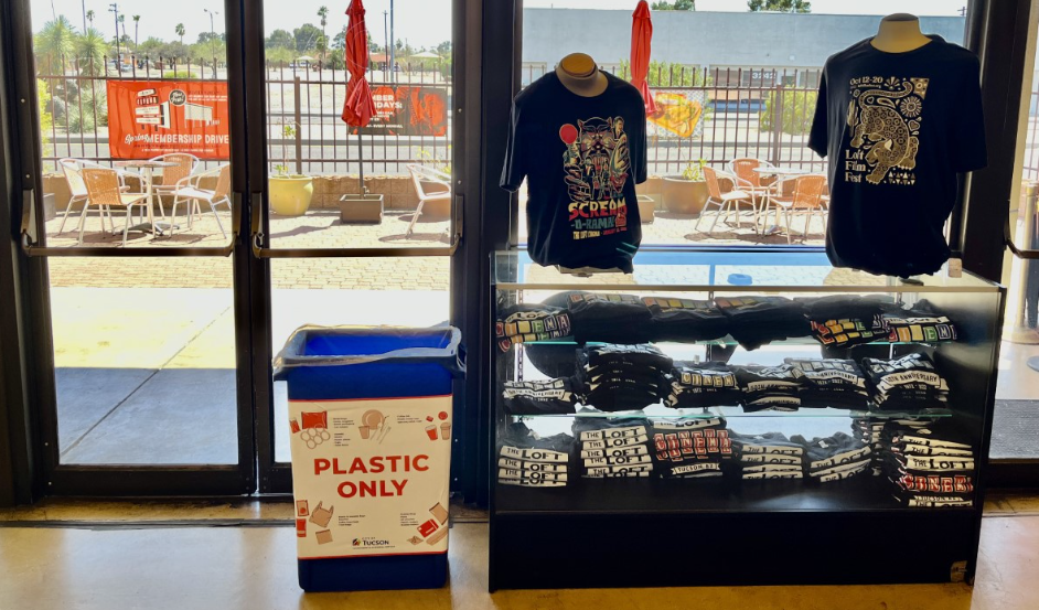 Picture shows "plastic only" bin is placed next to the t-shirt displays at the Loft Cinema's 