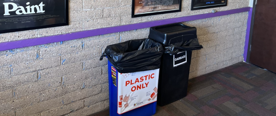 Picture shows the plastic only bin is placed next to the regular garbage bin at the Loft Cinema