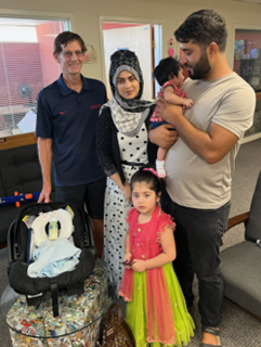 Picture of Steve Kozachik, Judge Ahmad, his wife, and his children