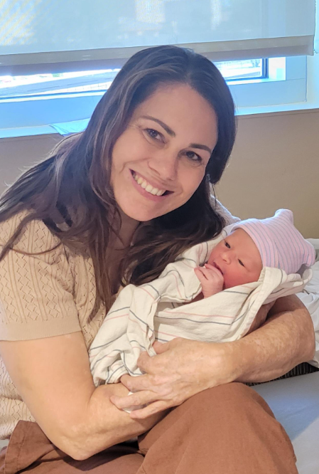 Picture of Diana Amado holds her first grandchild, Scarlett Margarita Amado