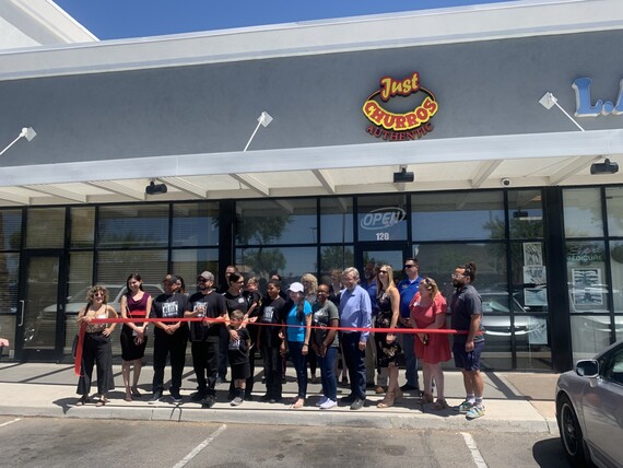 Staff standing outside of Just Churros business establishment